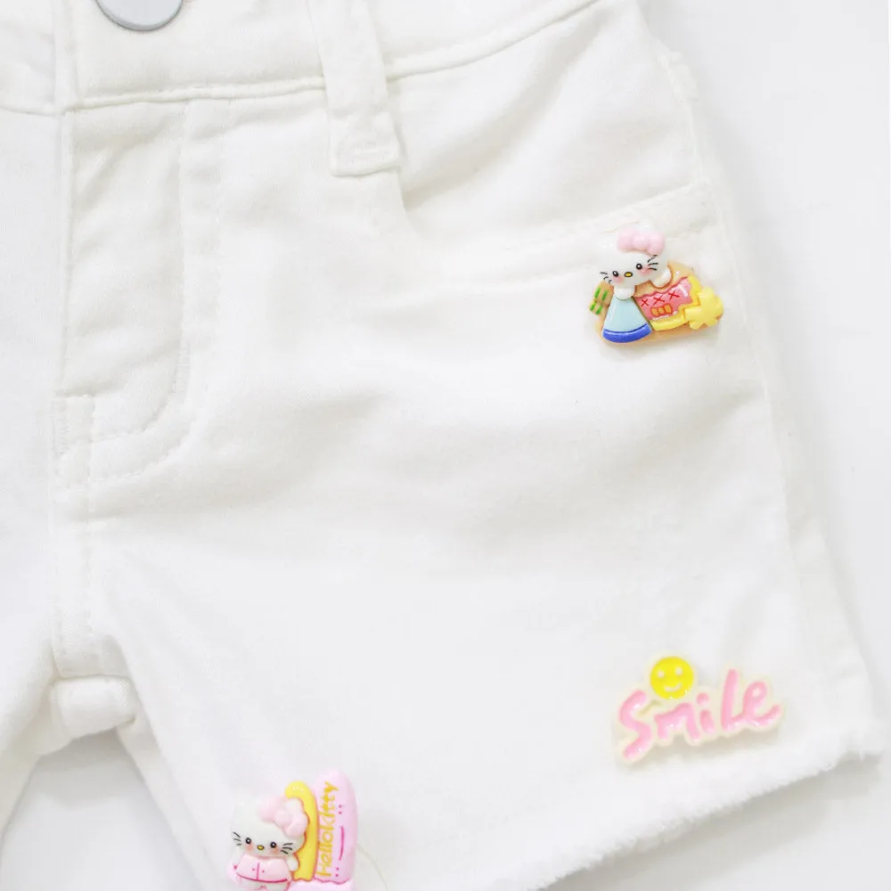 White Brooch Embellished Raw Hem Shorts